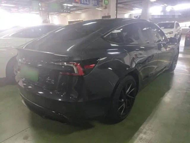 Tesla Model 3 — Фото автомобиля 6