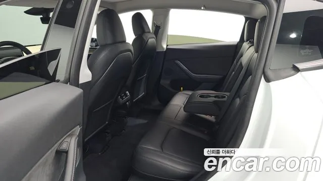 Tesla Model Y — Фото автомобиля 25