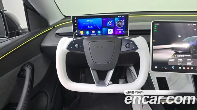 Tesla Model Y — Фото автомобиля 13