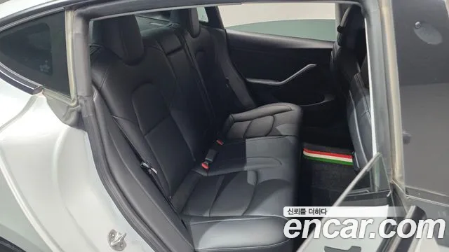 Tesla Model 3 — Фото автомобиля 18