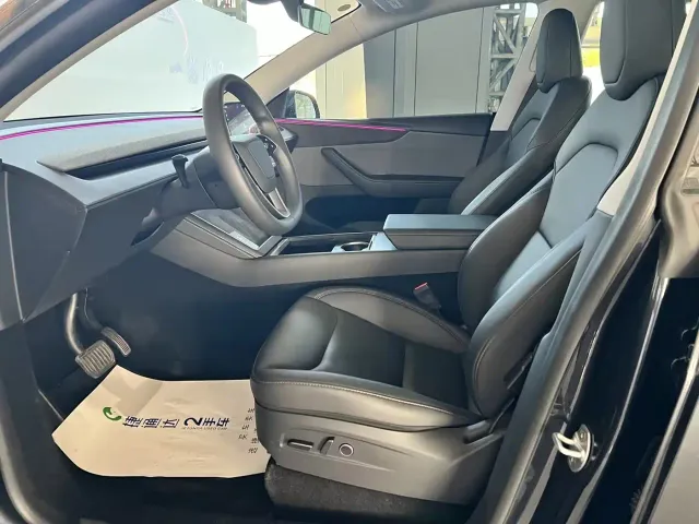 Tesla Model Y — Фото автомобиля 24
