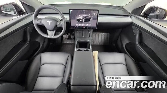 Tesla Model Y — Фото автомобиля 10