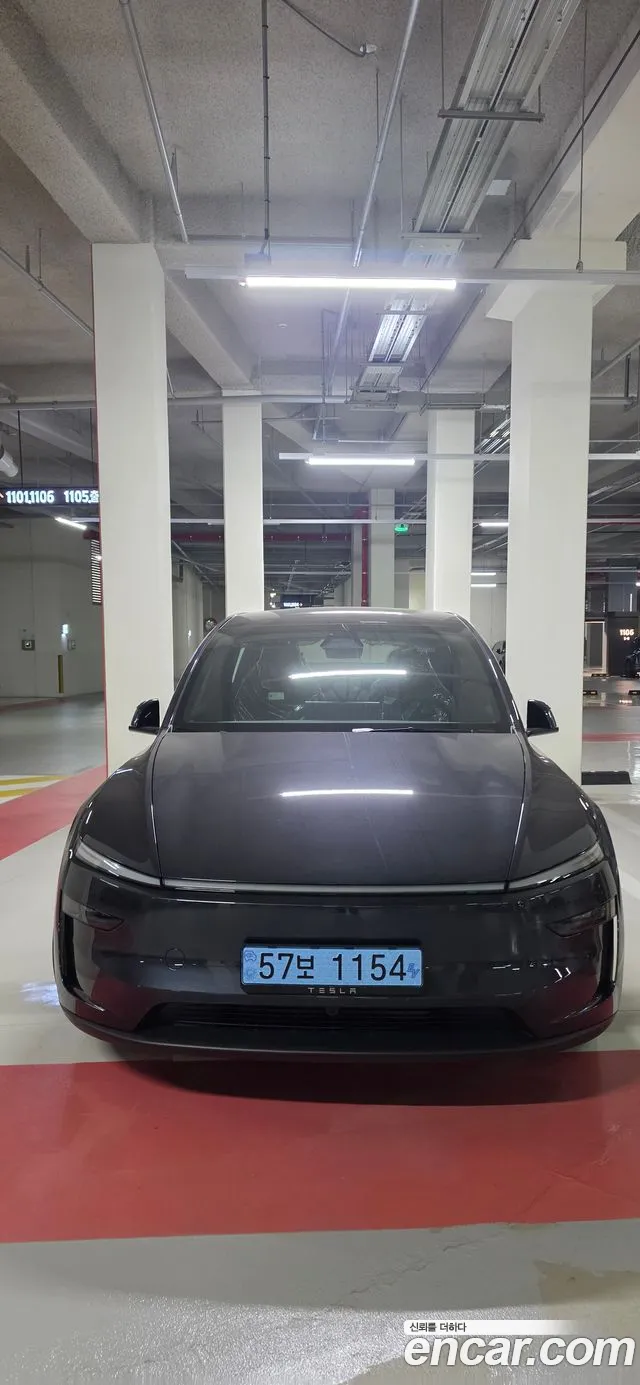 Tesla Model Y — Фото автомобиля 4
