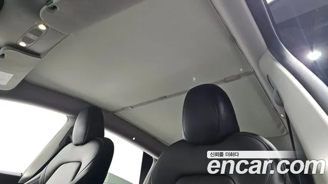 Tesla Model Y — Фото автомобиля 18