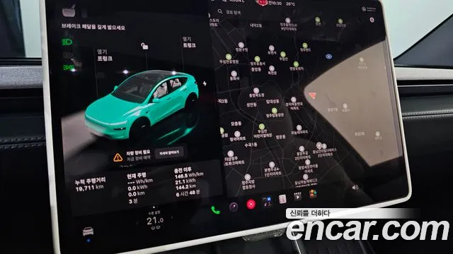 Tesla Model Y — Фото автомобиля 14