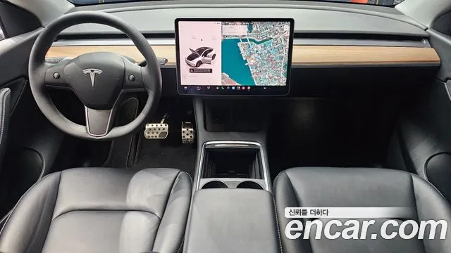 Tesla Model Y — Фото автомобиля 7