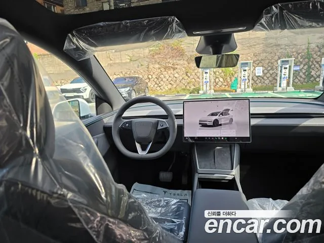 Tesla Model Y — Фото автомобиля 7