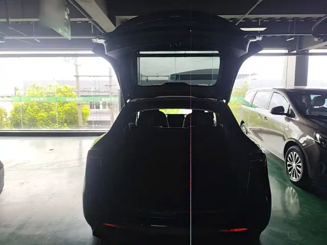 Tesla Model Y — Фото автомобиля 18