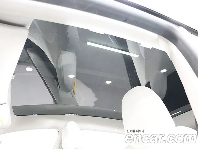 Tesla Model Y — Фото автомобиля 6