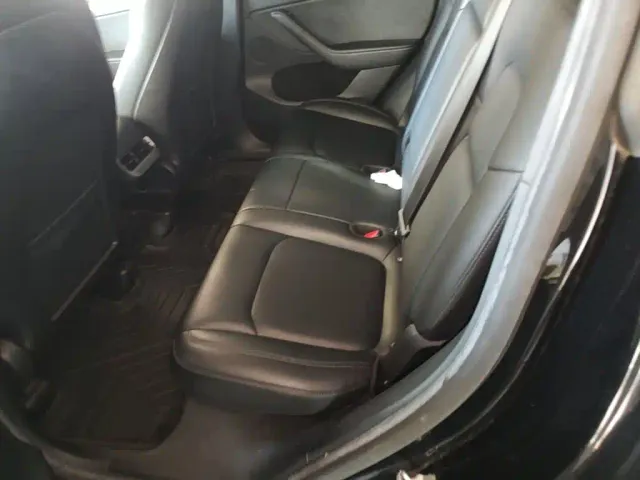 Tesla Model Y — Фото автомобиля 16