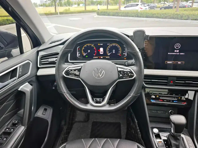 Volkswagen Tiguan L — Фото автомобиля 14