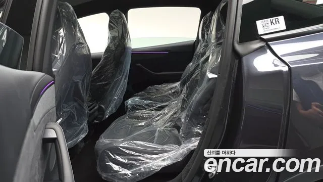 Tesla Model Y — Фото автомобиля 18