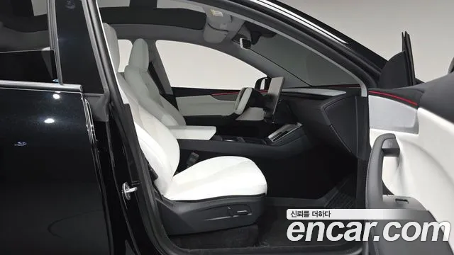 Tesla Model Y — Фото автомобиля 12
