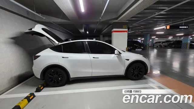 Tesla Model Y — Фото автомобиля 19