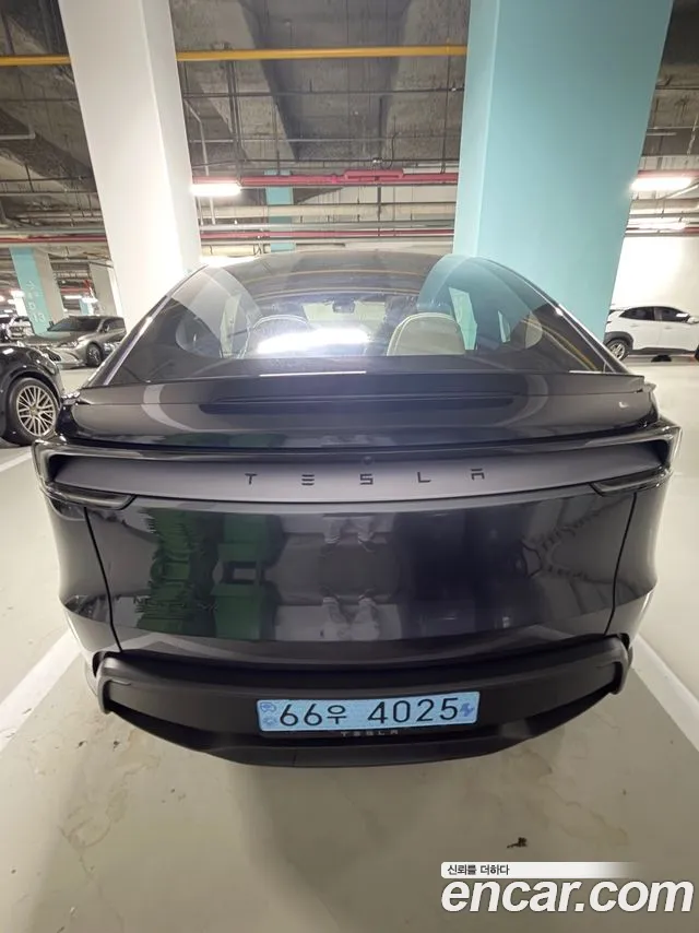 Tesla Model Y — Фото автомобиля 3