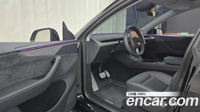 Tesla Model Y — Фото автомобиля 6