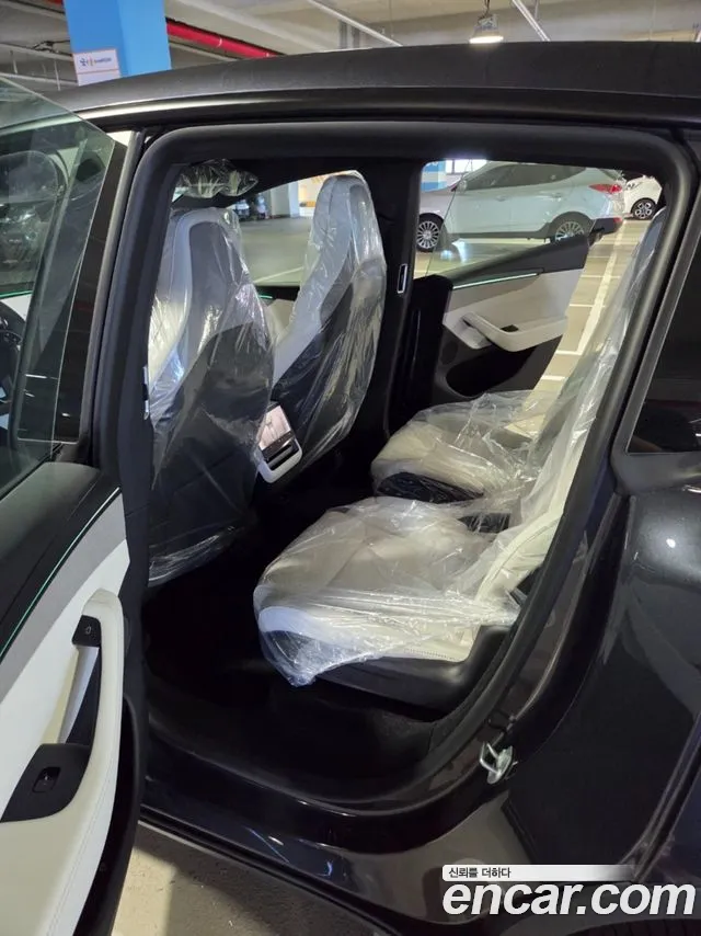 Tesla Model Y — Фото автомобиля 7