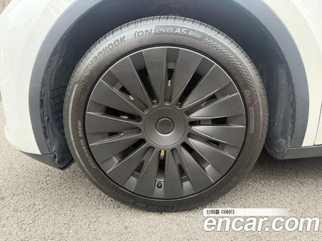 Tesla Model Y — Фото автомобиля 7