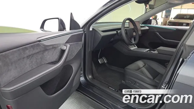 Tesla Model Y — Фото автомобиля 10