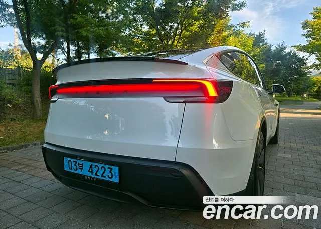 Tesla Model Y — Фото автомобиля 6