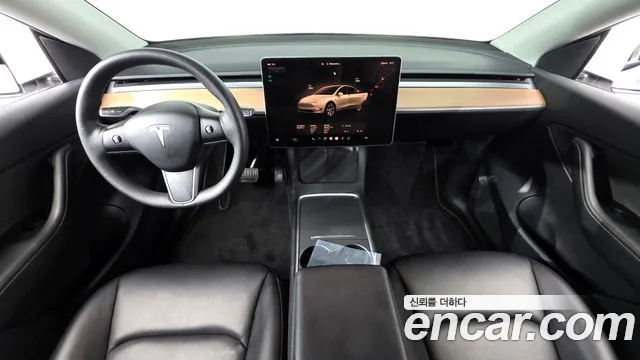 Tesla Model Y — Фото автомобиля 10