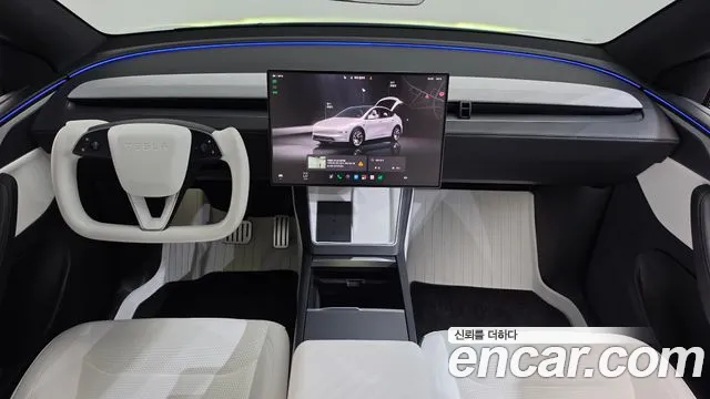 Tesla Model Y — Фото автомобиля 6