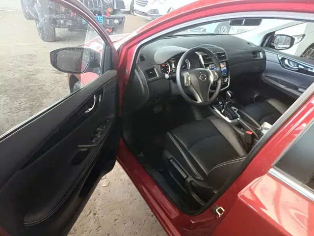 Nissan Tiida — Фото автомобиля 15