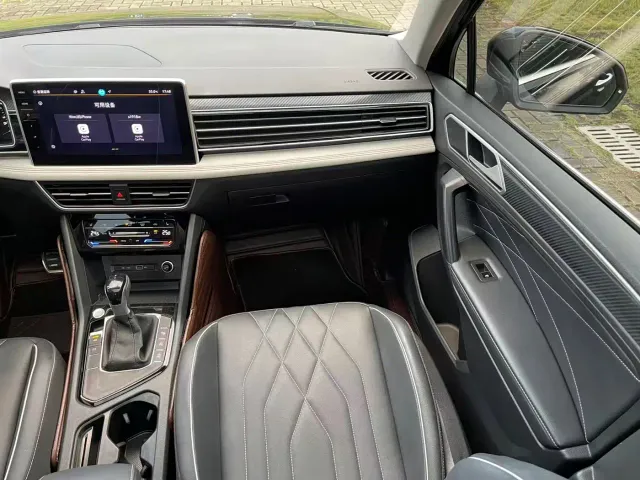 Volkswagen Tiguan L — Фото автомобиля 22