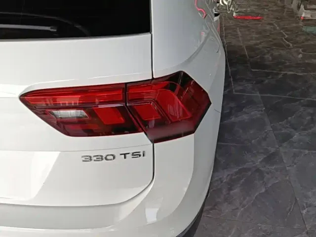 Volkswagen Tiguan L — Фото автомобиля 7