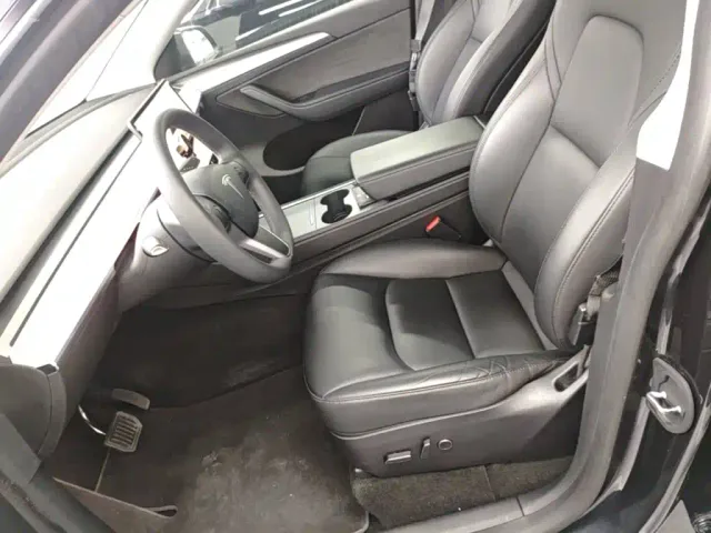 Tesla Model Y — Фото автомобиля 14