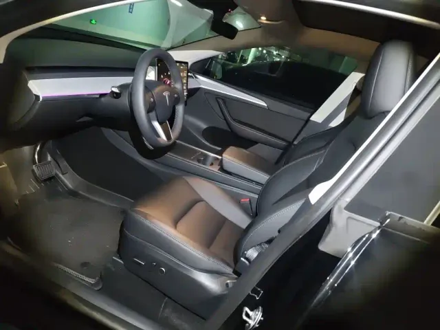 Tesla Model Y — Фото автомобиля 16