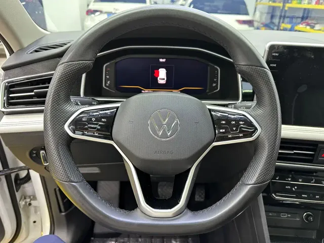 Volkswagen Tiguan L — Фото автомобиля 13