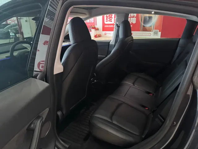 Tesla Model Y — Фото автомобиля 8