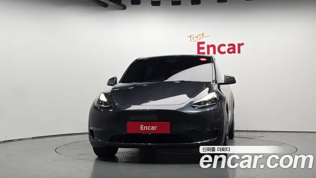 Tesla Model Y — Фото автомобиля 3