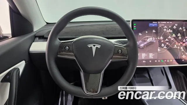 Tesla Model Y — Фото автомобиля 19