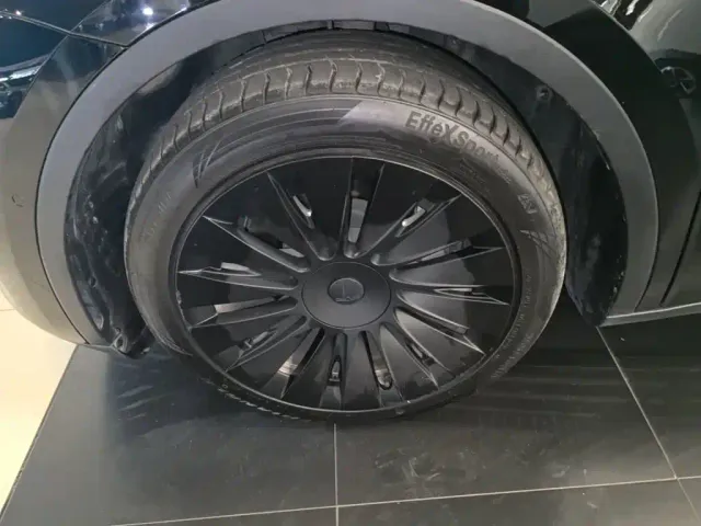 Tesla Model Y — Фото автомобиля 22