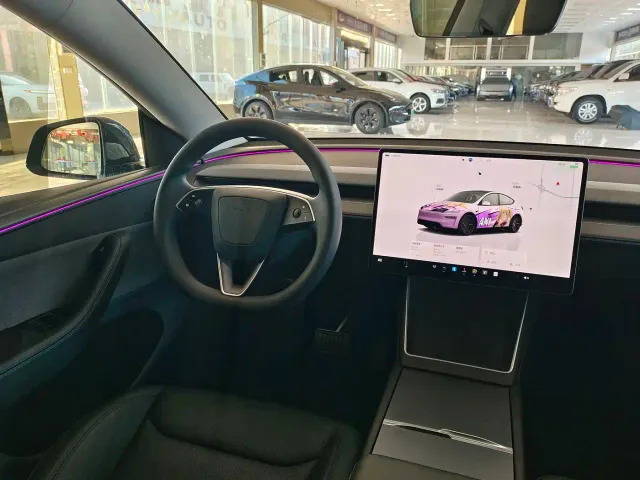 Tesla Model Y — Фото автомобиля 12