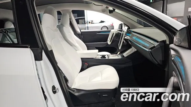 Tesla Model Y — Фото автомобиля 18