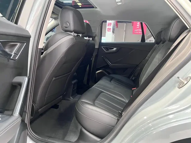 Audi Q2L — Фото автомобиля 11