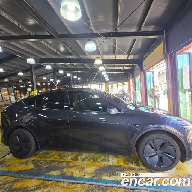 Tesla Model Y — Фото автомобиля 2
