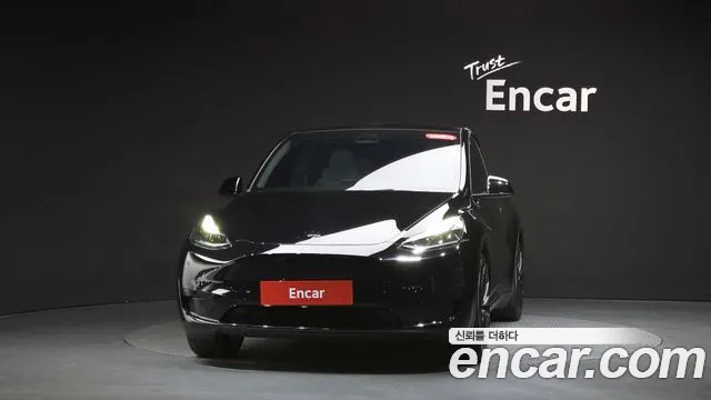 Tesla Model Y — Фото автомобиля 3