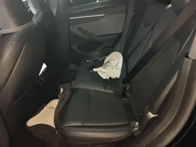 Tesla Model Y — Фото автомобиля 18