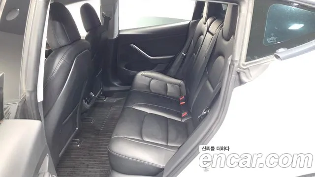 Tesla Model 3 — Фото автомобиля 17