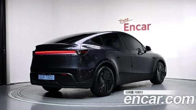 Tesla Model Y — Фото автомобиля 2