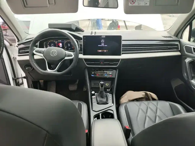 Volkswagen Tiguan L — Фото автомобиля 9