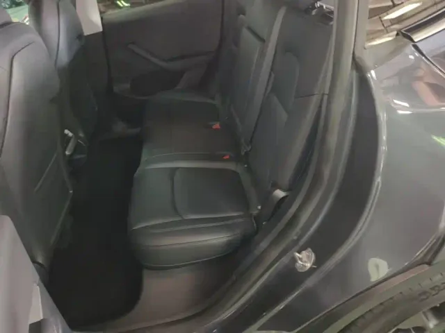 Tesla Model Y — Фото автомобиля 16