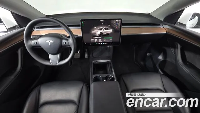 Tesla Model Y — Фото автомобиля 10