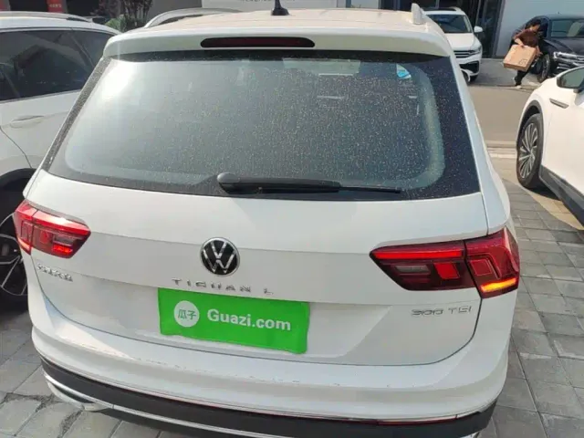 Volkswagen Tiguan L — Фото автомобиля 5