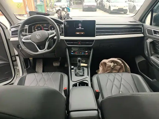 Volkswagen Tiguan L — Фото автомобиля 9