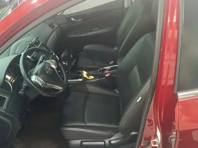 Nissan Tiida — Фото автомобиля 14